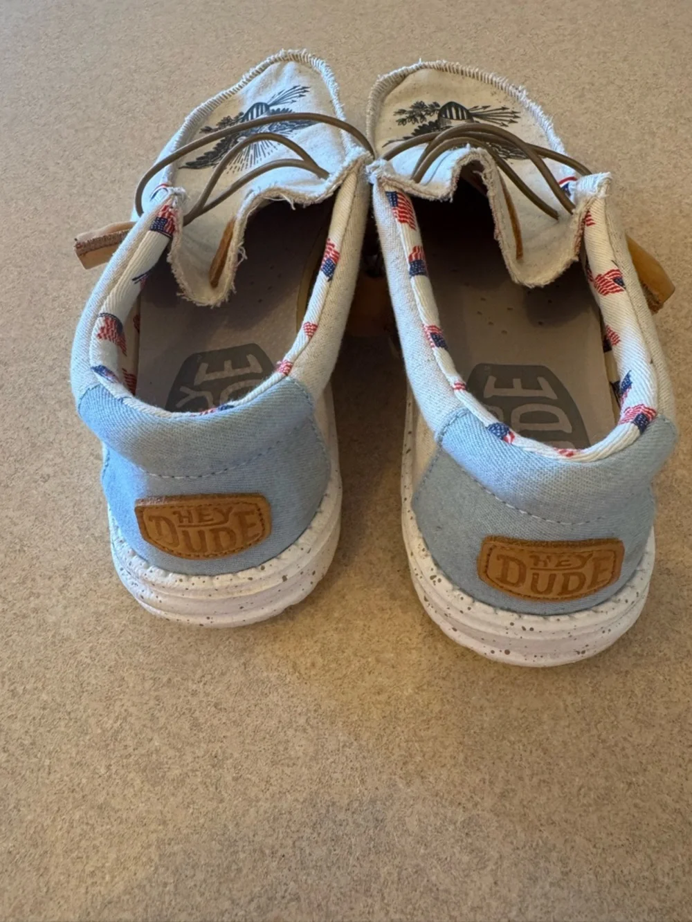 Hey Dude Cream Canvas Boat Shoes with Black Eagle Print